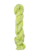 Green and yellow skein of yarn on a white background