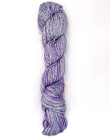 Braided purple yarn on a white background